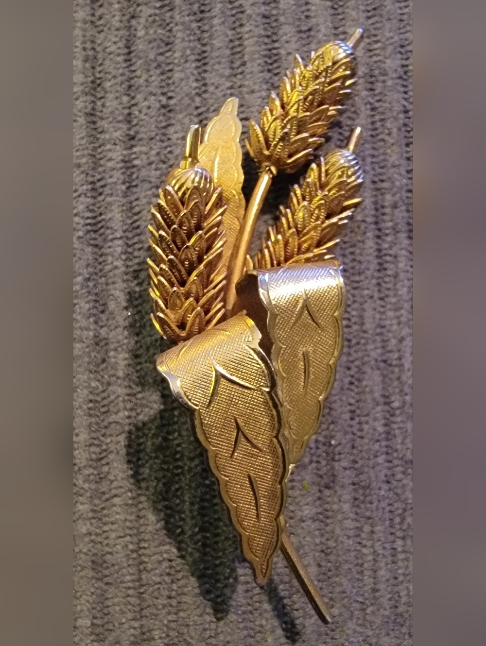Vintage mid-century brooch features a unique cat tail or wheat theme design